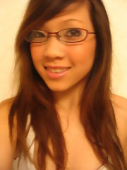 Cute Asian sweetie taking selfpics plus one semi-topless discharged