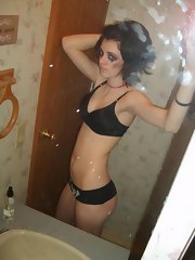 Sexy brunette emo chick self-shooting topless