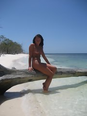 Kinky naughty wife goes topless in a beach
