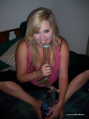 Curvy blond with a bong between her juicy tits