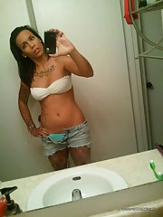 Nice hot photo gallery of an inked and pierced chick camwhoring