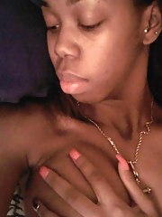 Amateur ebony GF with pierced nips taking topless pics