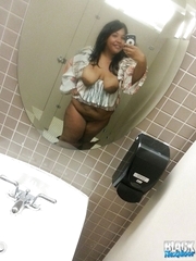 Black chubby cutie spreading her pussy